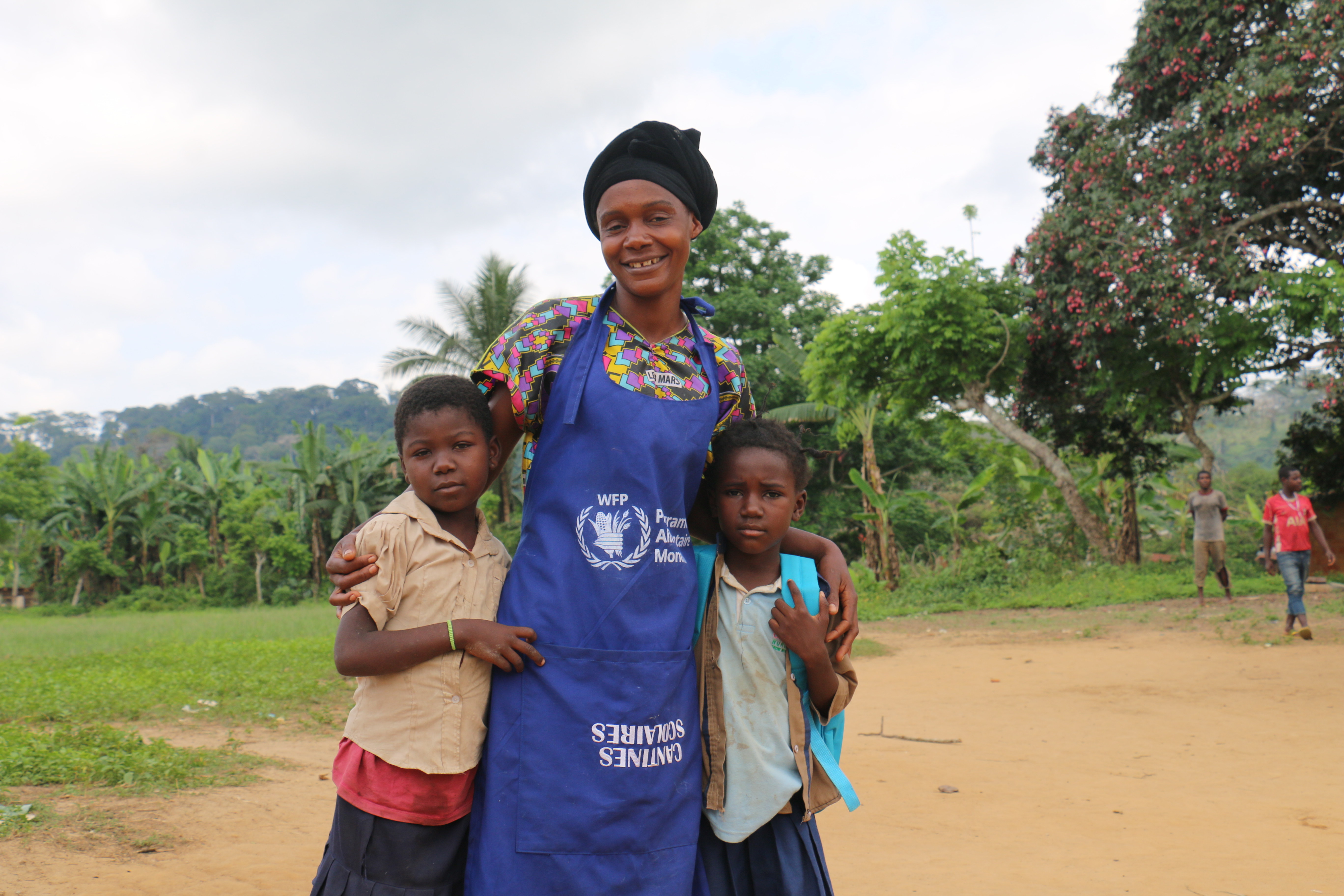 Photo: Blanche Tsouari, an indigenous volunteer cook and mother of six children, two of whom attend school in Makoubi. WFP/Cécile Mercier